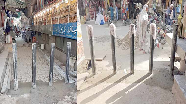 بلاک نمبر3کے کاروباری مرکز  میں موٹرسائیکلوں کا داخلہ  بند،اے سی نے بیرئیر لگوا دئیے