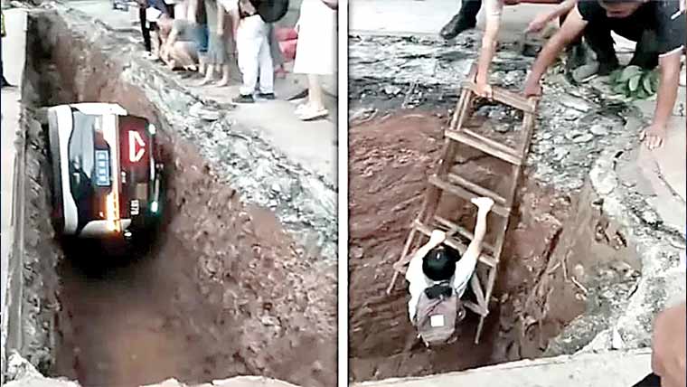 چین میں روبو ٹیکسی تعمیراتی گڑھے میں جا گری