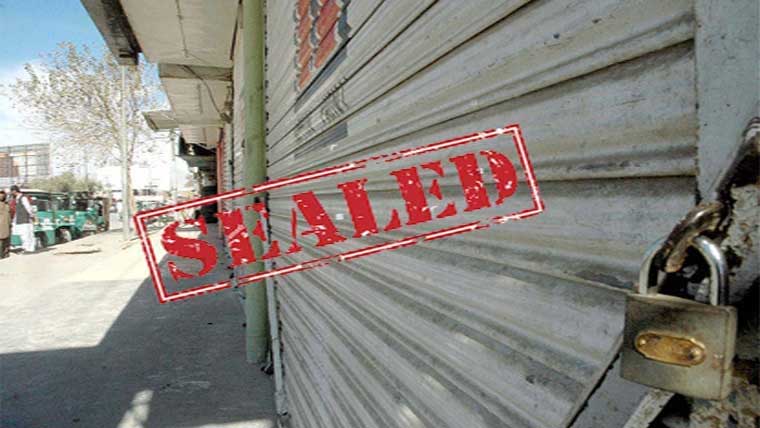 عالم چوک:تجاوزات ختم نہ  کرنے پر متعدد دکانیں سیل