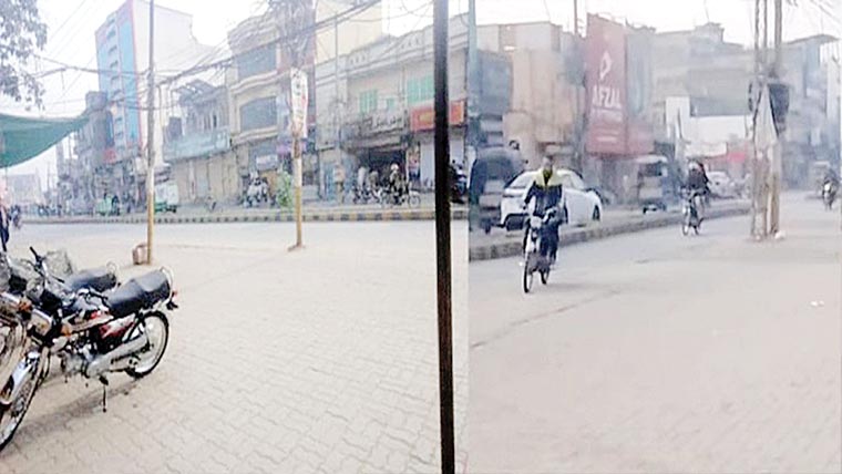 سیالکوٹ : نو تعمیر سڑک کے درمیان کھمبے: ٹریفک بہائو میں رکاوٹ