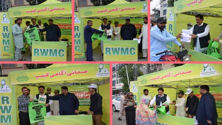 راجہ حنیف کا صفائی کیمپ کا دورہ، ویسٹ بیگز، پمفلٹس تقسیم