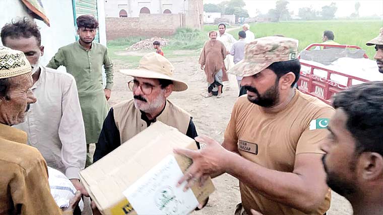 موضع محرم کاٹھیا کے سیلاب زدگان میں راشن بیگز تقسیم 