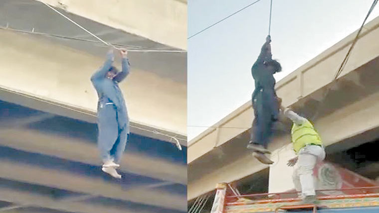 فلائی اوور پر نشے کا عادی شخص تاروں سے لٹک گیا