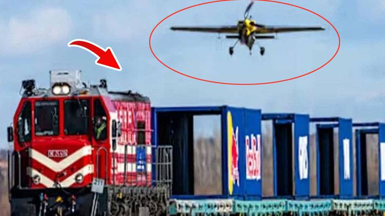 اطالوی پائلٹ نے پہلی بار چلتی  ٹرین پر طیارہ اتار کر تاریخ رقم کر دی