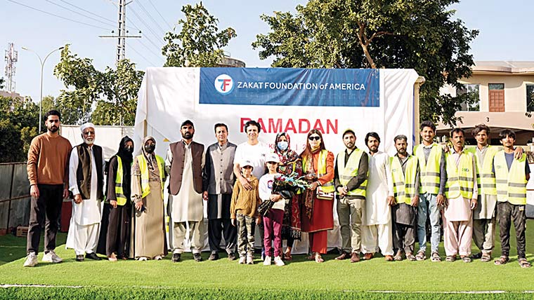 سوشل کوآپریشن انیشی ایٹو اور زکوٰۃ  فاؤنڈیشن آف امریکہ کی جانب  سے مستحق افرادمیں راشن تقسیم 